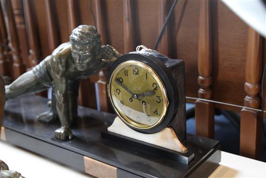 A French Art Deco marble figural mounted clock, 33in.